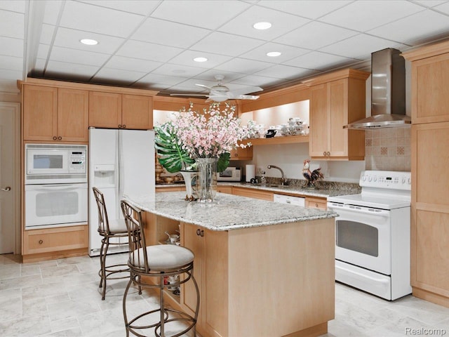 4326 Gratiot Ave, Port Huron, MI 48060 - kitchen featuring white appliances, wall chimney exhaust hood, a kitchen island, a sink, and a kitchen breakfast bar
