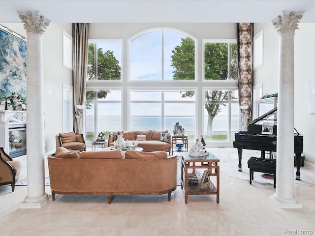 4326 Gratiot Ave, Port Huron, MI 48060 - living area with a towering ceiling, decorative columns, and healthy amount of natural light