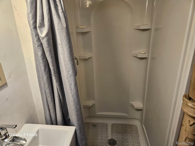 18941 Puritan St, Detroit, MI 48223 - bathroom with curtained shower and a sink