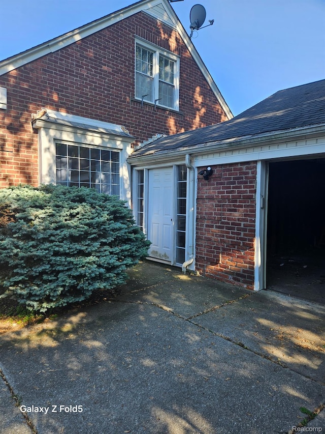 18941 Puritan St, Detroit, MI 48223 - view of side of home with brick siding