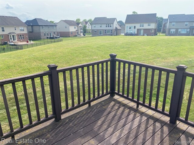 29337 Woodpark Cir Unit 60, Warren, MI 48092 - deck with a residential view and a lawn