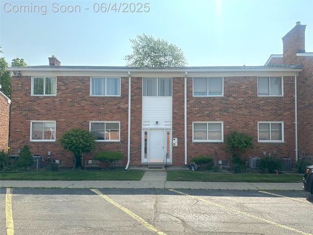 29330 Hoover Rd Unit 330, Warren, MI 48093 - view of building exterior featuring uncovered parking and cooling unit