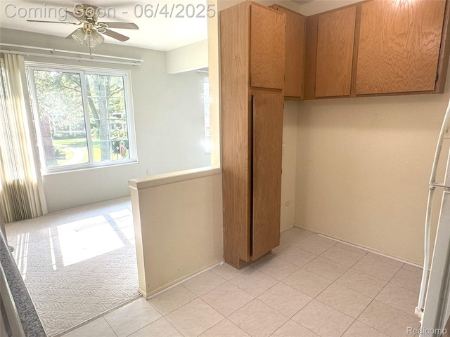 29330 Hoover Rd Unit 330, Warren, MI 48093 - kitchen with a ceiling fan and light tile patterned floors