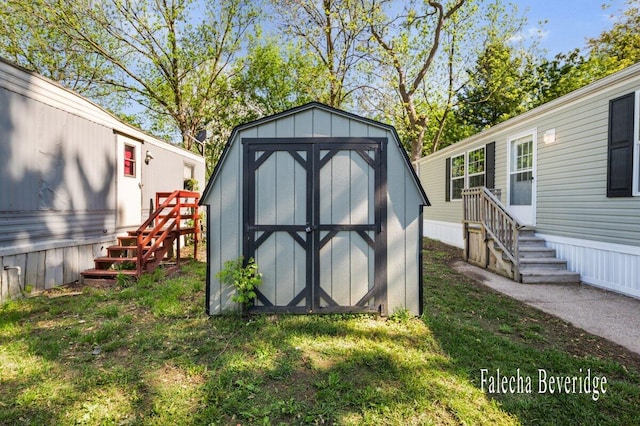 2575 Theodore Ave, Hudsonville, MI 49426 - view of shed featuring stairway