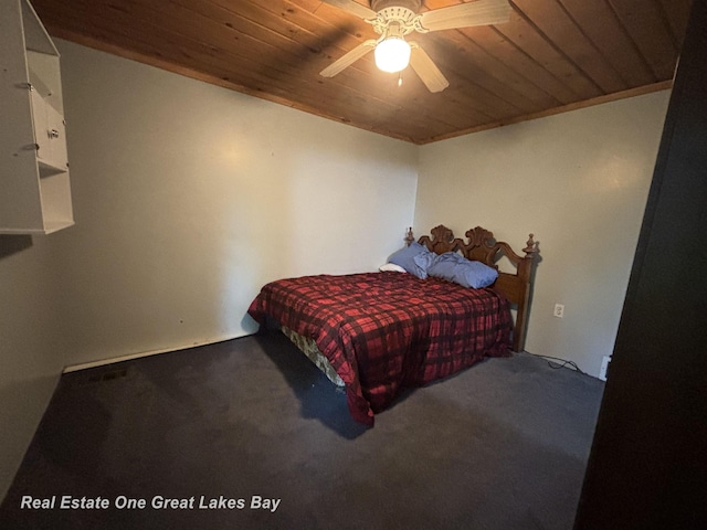 8446 Bamfield Rd, South Branch, MI 48761 - bedroom with wooden ceiling, carpet floors, and ceiling fan