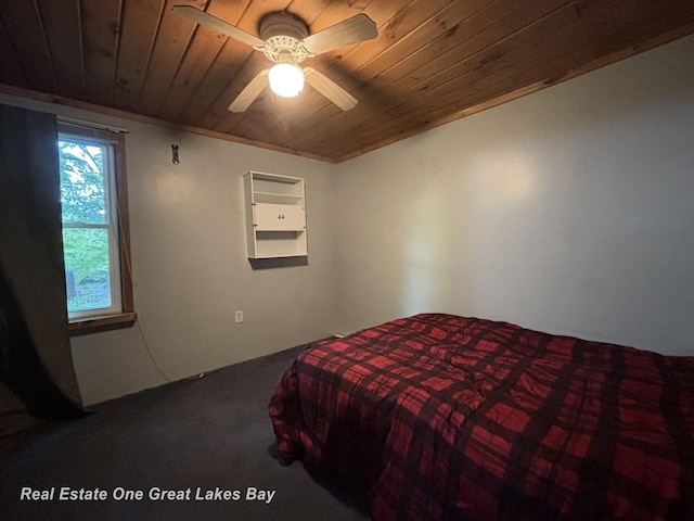 8446 Bamfield Rd, South Branch, MI 48761 - bedroom featuring wooden ceiling, carpet floors, and a ceiling fan