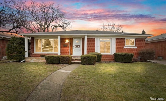 28876 Palm Beach Dr, Warren, MI 48093 - view of front of house with brick siding and a lawn