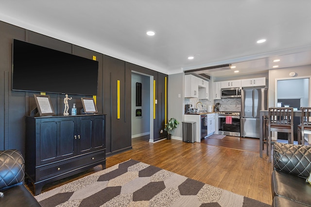 3313 Normandy Rd, Royal Oak, MI 48073 - living room with dark wood-type flooring, baseboards, and recessed lighting