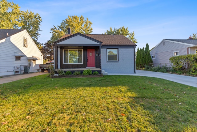 3313 Normandy Rd, Royal Oak, MI 48073 - view of front facade featuring brick siding and a front yard