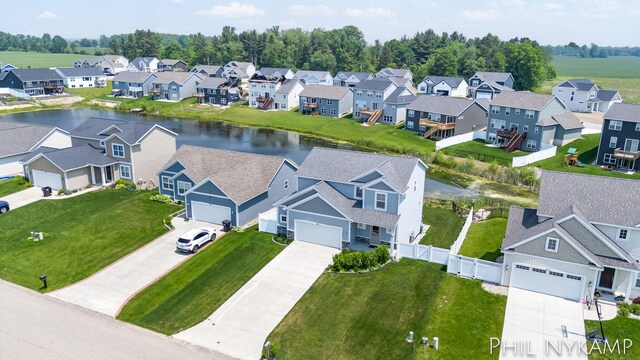 3880 Elm Ridge Dr, Holland, MI 49424 - aerial perspective of suburban area with a nearby body of water