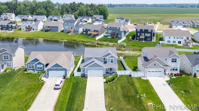 3880 Elm Ridge Dr, Holland, MI 49424 - aerial perspective of suburban area with a nearby body of water