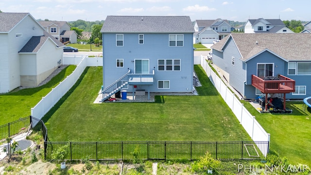 3880 Elm Ridge Dr, Holland, MI 49424 - rear view of property featuring a residential view and a patio area