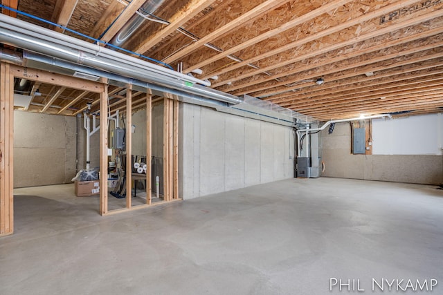 3880 Elm Ridge Dr, Holland, MI 49424 - unfinished below grade area with electric panel and heating unit