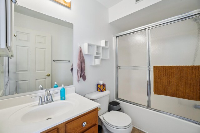 1870 Lindsay Ln, Ann Arbor, MI 48104 - bathroom with vanity, toilet, and enclosed tub / shower combo