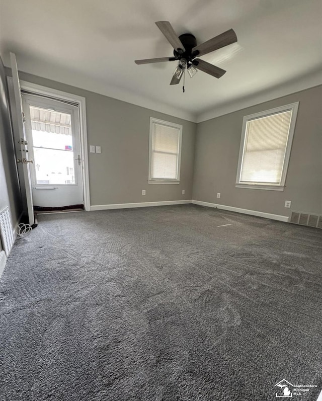 17765 Ruth St, Melvindale, MI 48122 - unfurnished room featuring a ceiling fan, baseboards, and carpet floors