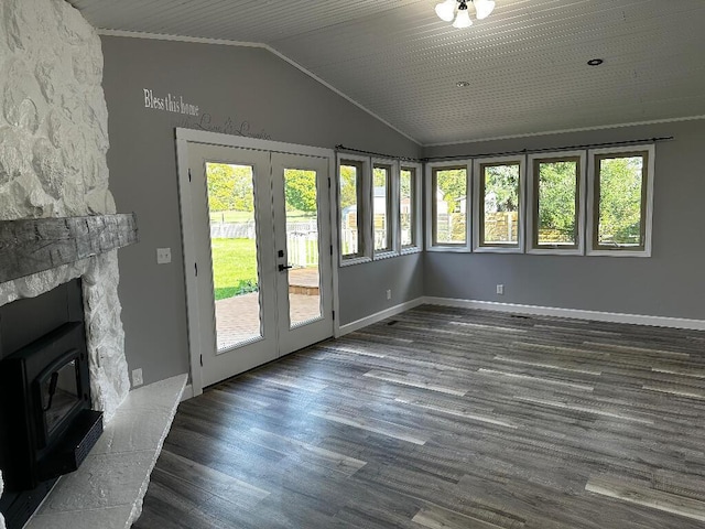 775 Riverview Dr, Plainwell, MI 49080 - unfurnished living room featuring french doors, vaulted ceiling, wood finished floors, and baseboards