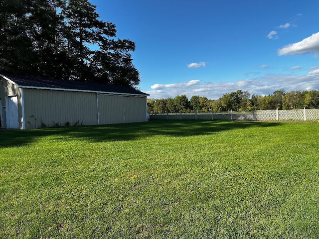 775 Riverview Dr, Plainwell, MI 49080 - view of yard with a pole building and an outdoor structure