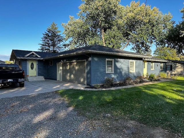 775 Riverview Dr, Plainwell, MI 49080 - ranch-style house with an attached garage, concrete driveway, and a front lawn