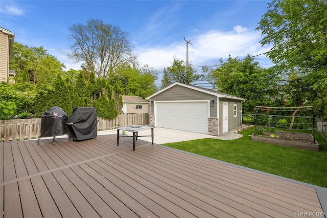 10541 Hart Ave, Huntington Woods, MI 48070 - deck featuring an outbuilding, a garage, a grill, and a garden