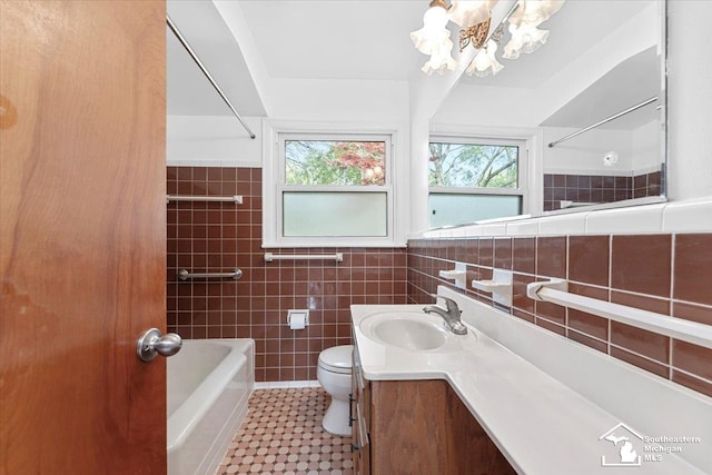 8691 Louise St, Allen Park, MI 48101 - full bath with toilet, tile walls, vanity, a chandelier, and shower / washtub combination