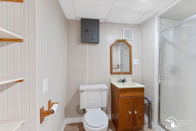8691 Louise St, Allen Park, MI 48101 - full bathroom featuring electric panel, vanity, a stall shower, and toilet