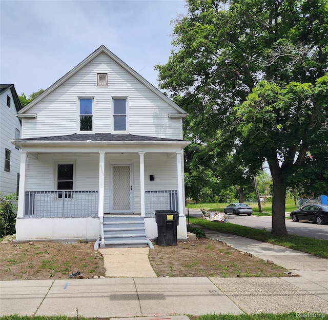 8103 E Canfield St, Detroit, MI 48214 - view of front of home with covered porch
