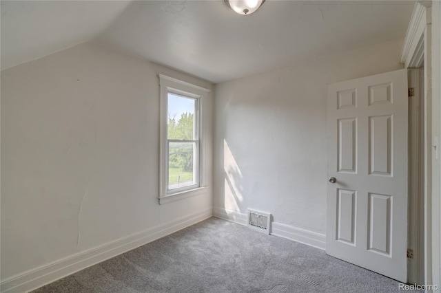 8103 E Canfield St, Detroit, MI 48214 - bonus room featuring carpet, vaulted ceiling, and baseboards