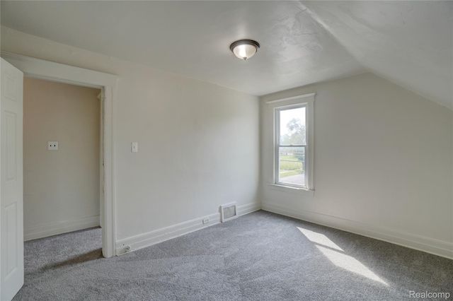 8103 E Canfield St, Detroit, MI 48214 - additional living space featuring carpet, vaulted ceiling, and baseboards