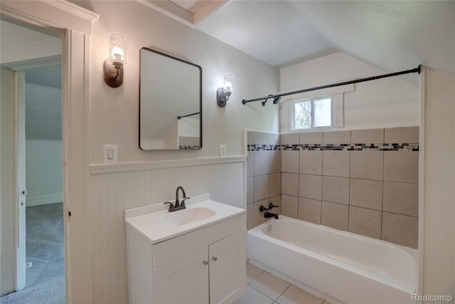 8103 E Canfield St, Detroit, MI 48214 - bathroom featuring bathtub / shower combination, vanity, a wainscoted wall, vaulted ceiling, and tile patterned floors