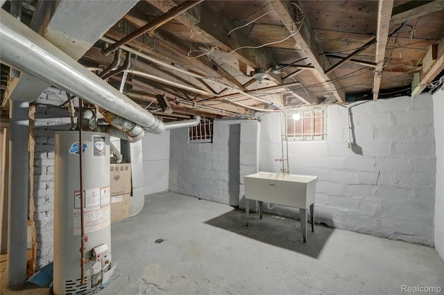 8103 E Canfield St, Detroit, MI 48214 - unfinished basement featuring water heater