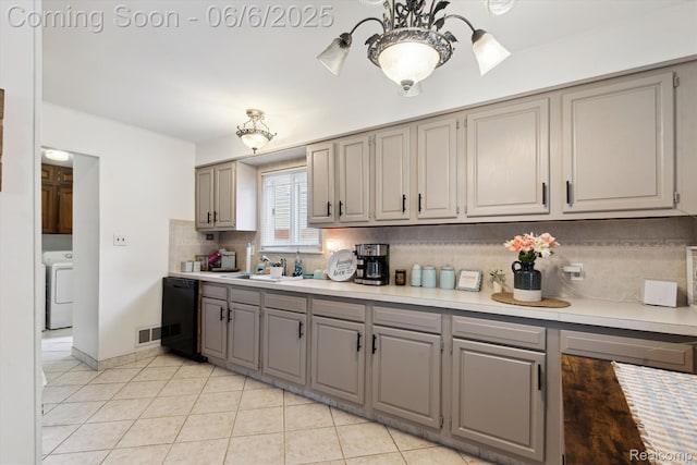 6057 Sylvia St, Taylor, MI 48180 - kitchen featuring gray cabinetry, backsplash, light countertops, light tile patterned floors, and a sink