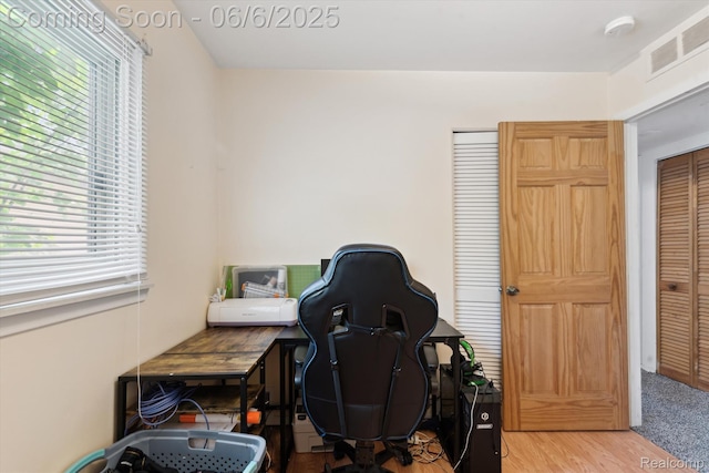 6057 Sylvia St, Taylor, MI 48180 - home office with plenty of natural light and wood finished floors