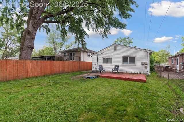 6057 Sylvia St, Taylor, MI 48180 - back of house with a wooden deck