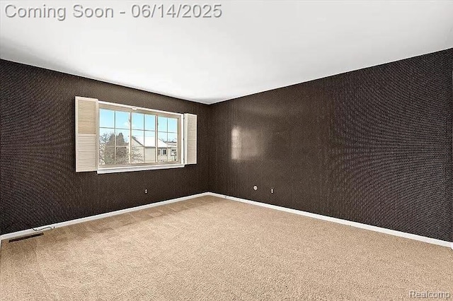 29146 W Wellington Unit 83, Southfield, MI 48034 - carpeted empty room with baseboards