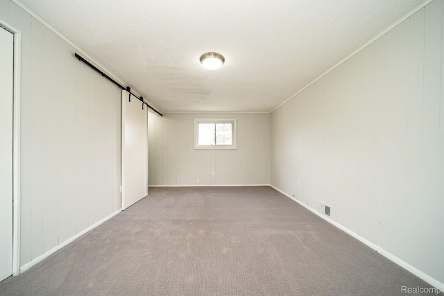 967 Keith St, Oxford, MI 48371 - unfurnished bedroom with carpet and a barn door