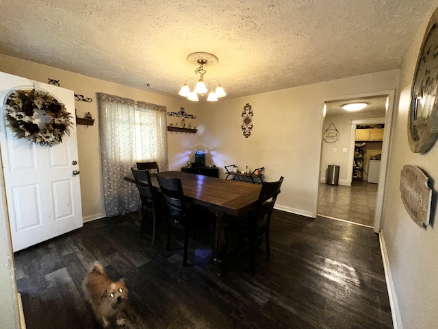 413 E Ganson St, Jackson, MI 49201 - dining space with wood finished floors, a textured ceiling, baseboards, and a chandelier