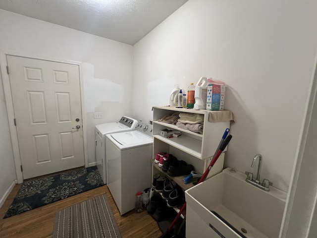 252 E Fenn Rd, Coldwater, MI 49036 - laundry room with independent washer and dryer and dark wood-style flooring