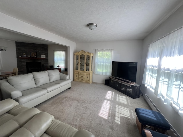 252 E Fenn Rd, Coldwater, MI 49036 - carpeted living room featuring a textured ceiling and a large fireplace