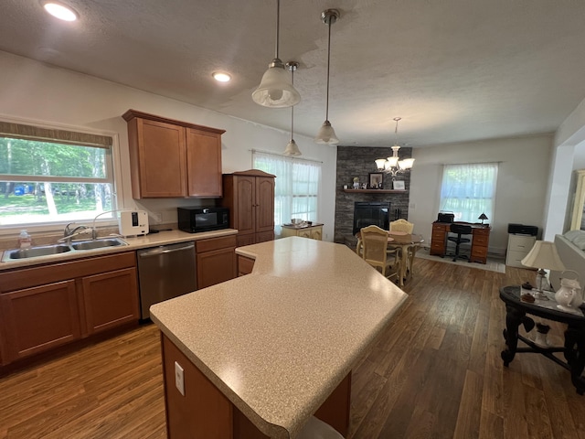 252 E Fenn Rd, Coldwater, MI 49036 - kitchen with dishwasher, a sink, black microwave, open floor plan, and recessed lighting