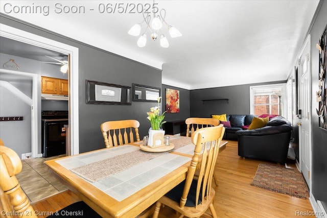 1731 N Franklin St, Dearborn, MI 48128 - dining area featuring light wood finished floors and a chandelier