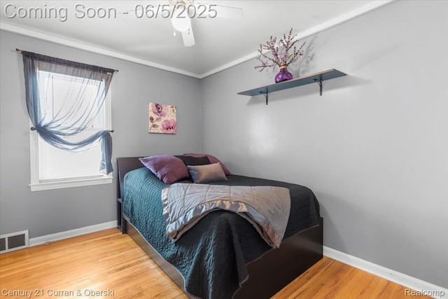 1731 N Franklin St, Dearborn, MI 48128 - bedroom with wood finished floors, baseboards, and a ceiling fan