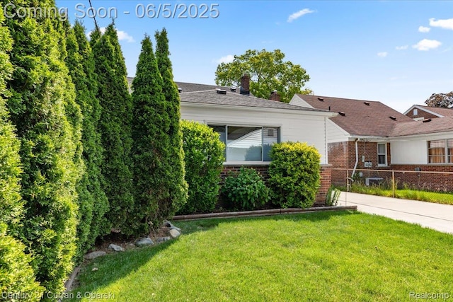 1731 N Franklin St, Dearborn, MI 48128 - view of side of property featuring brick siding and a chimney