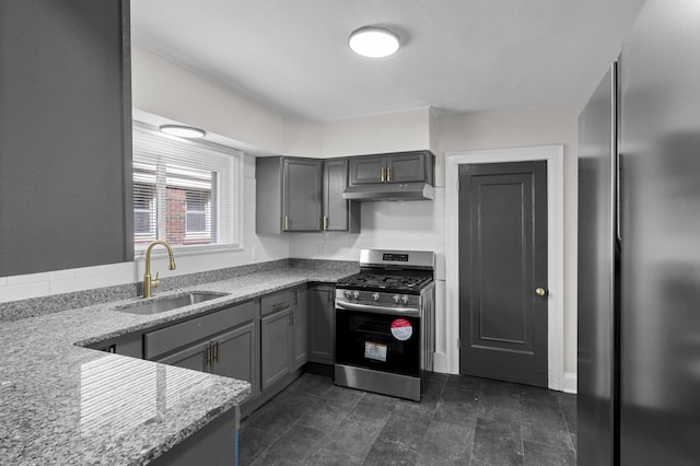 16631 Lawton St, Detroit, MI 48221 - kitchen featuring appliances with stainless steel finishes, a sink, under cabinet range hood, gray cabinets, and light stone counters