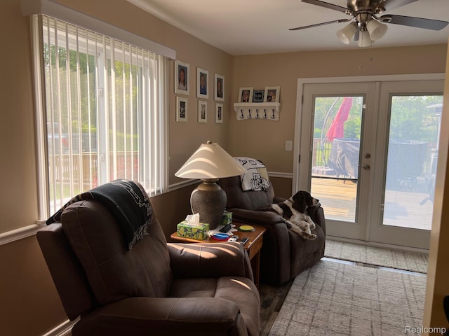 3742 W Barnes Lake Rd, Columbiaville, MI 48421 - living room with ceiling fan and french doors