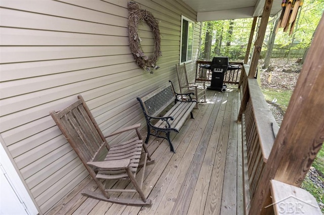 3485 Lakeshore Dr, Lupton, MI 48635 - wooden porch with area for grilling