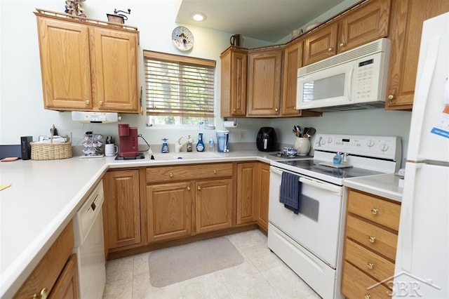 3485 Lakeshore Dr, Lupton, MI 48635 - kitchen featuring white appliances, a sink, light countertops, and light tile patterned floors
