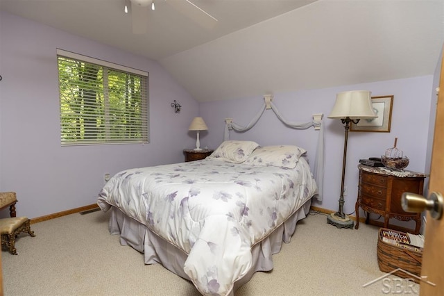 3485 Lakeshore Dr, Lupton, MI 48635 - carpeted bedroom with vaulted ceiling, baseboards, and a ceiling fan
