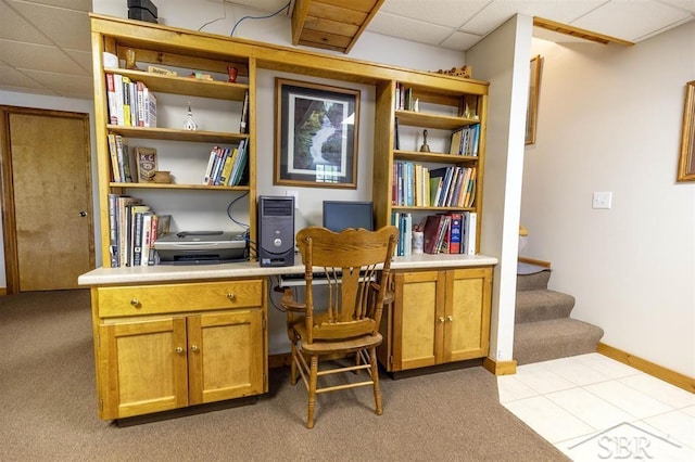 3485 Lakeshore Dr, Lupton, MI 48635 - office with a drop ceiling, light carpet, built in study area, and baseboards