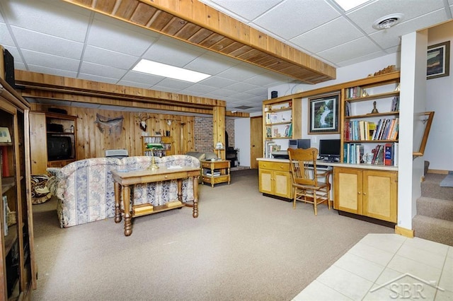 3485 Lakeshore Dr, Lupton, MI 48635 - office area with a drop ceiling, light colored carpet, wood walls, and baseboards