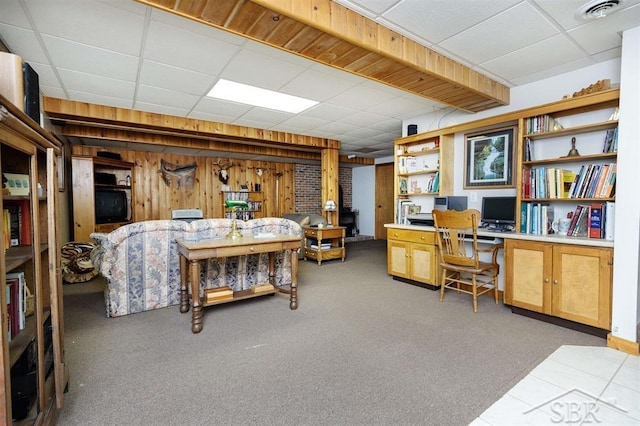 3485 Lakeshore Dr, Lupton, MI 48635 - carpeted home office with a drop ceiling and built in study area